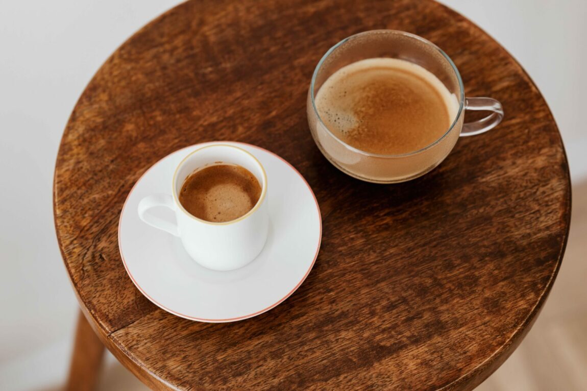 Round table with two coffee cups on it